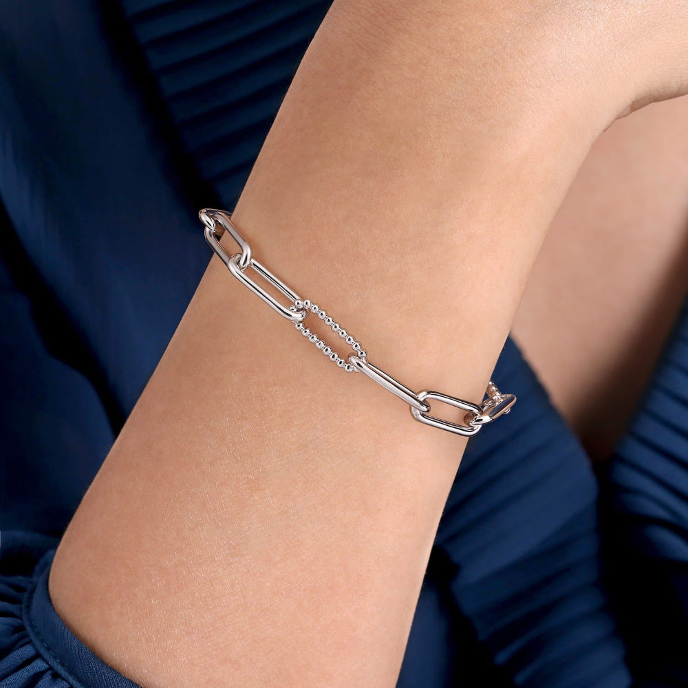 Persons arm wearing Sterling Silver chain bracelet