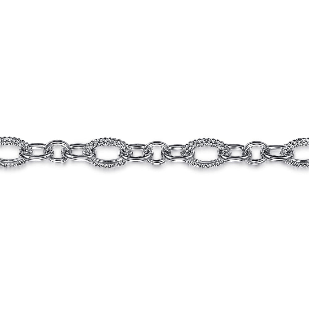 Triple link chain bracelet close up 