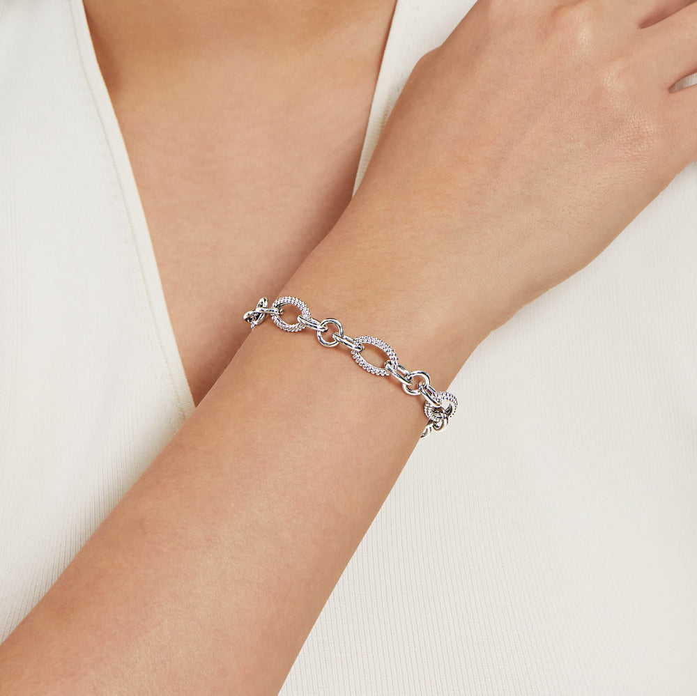 Woman wearing silver bracelet 