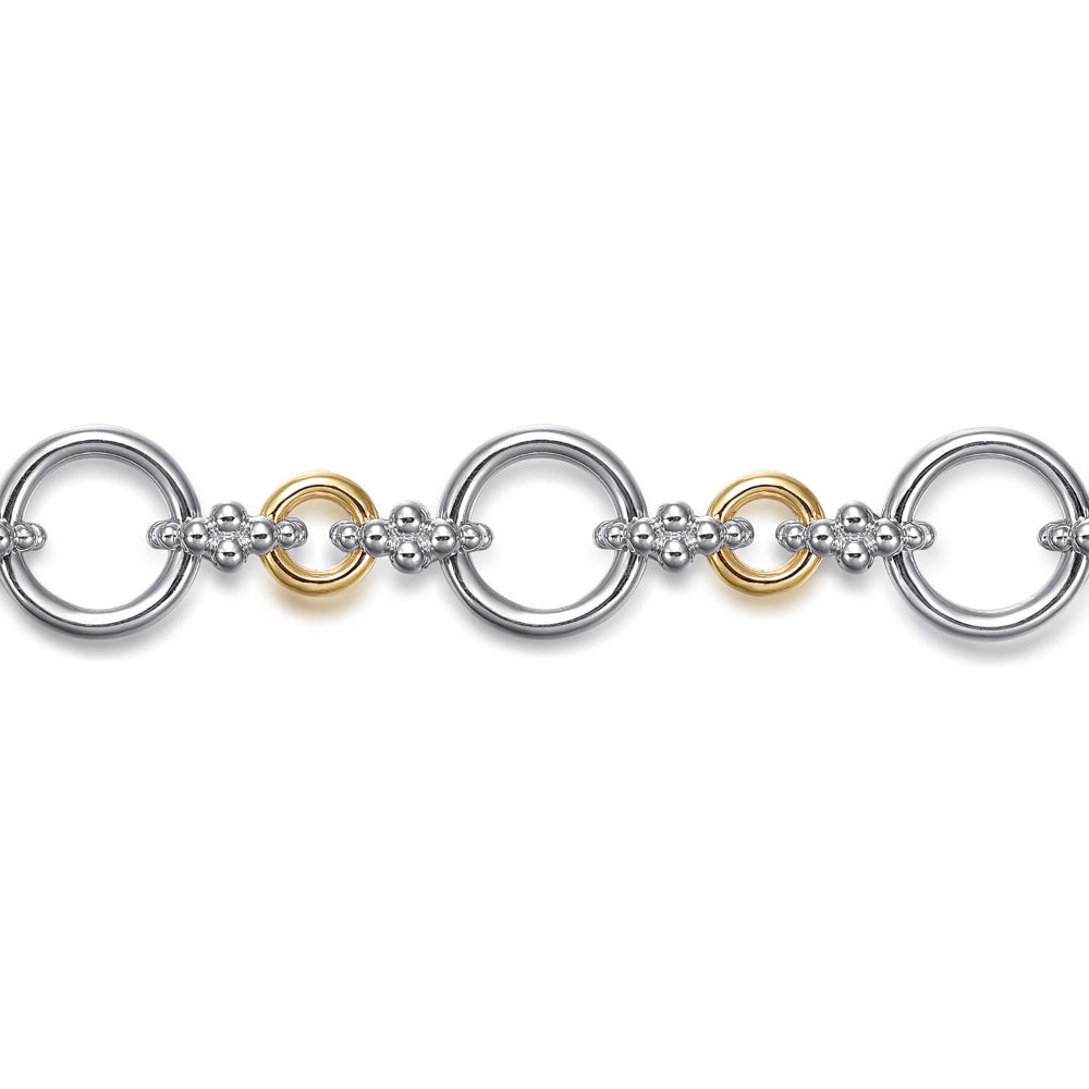 Close up of Silver and 14kyellow gold Hollow Tube Links