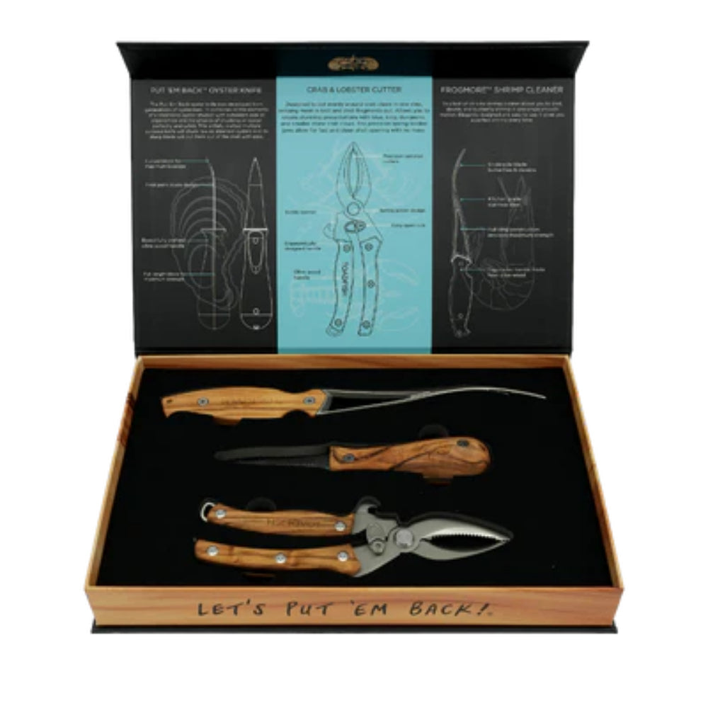 Set of seafood preparation tools in a wooden box with branded label