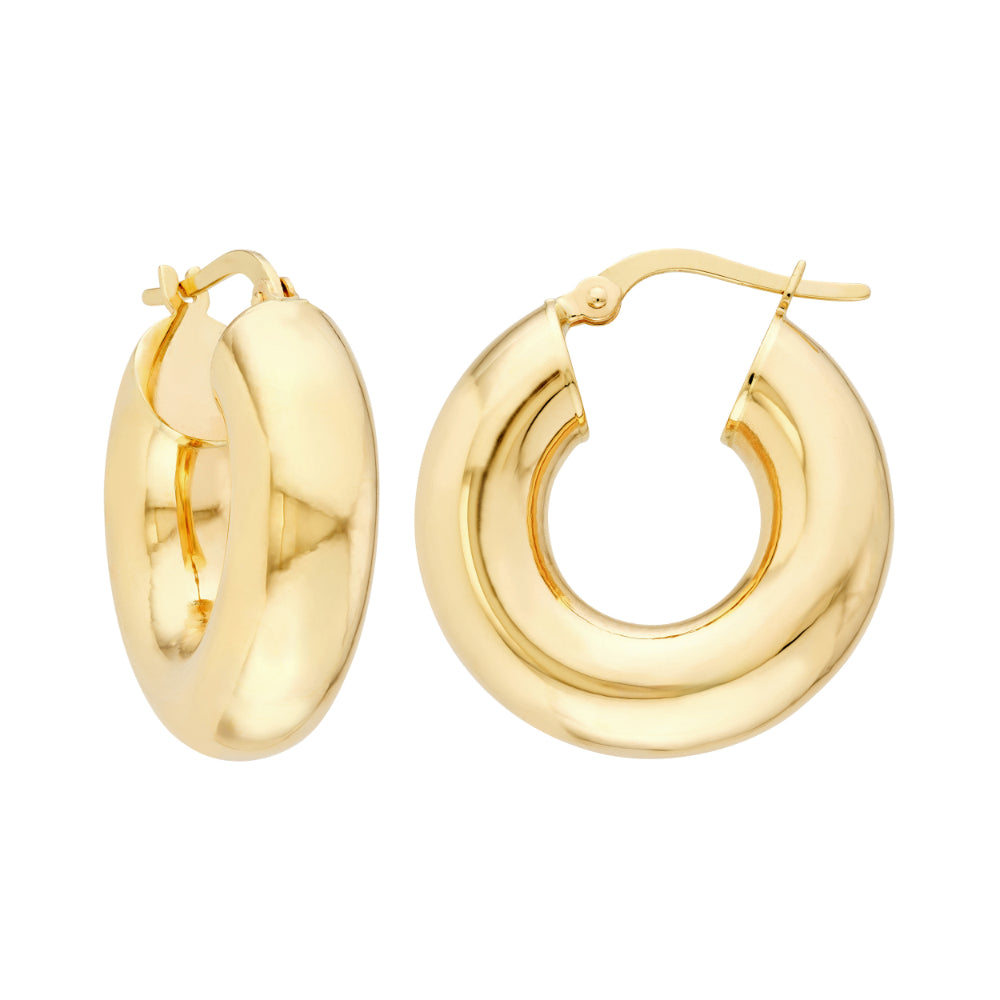 gold tone polished hoop earrings on white background