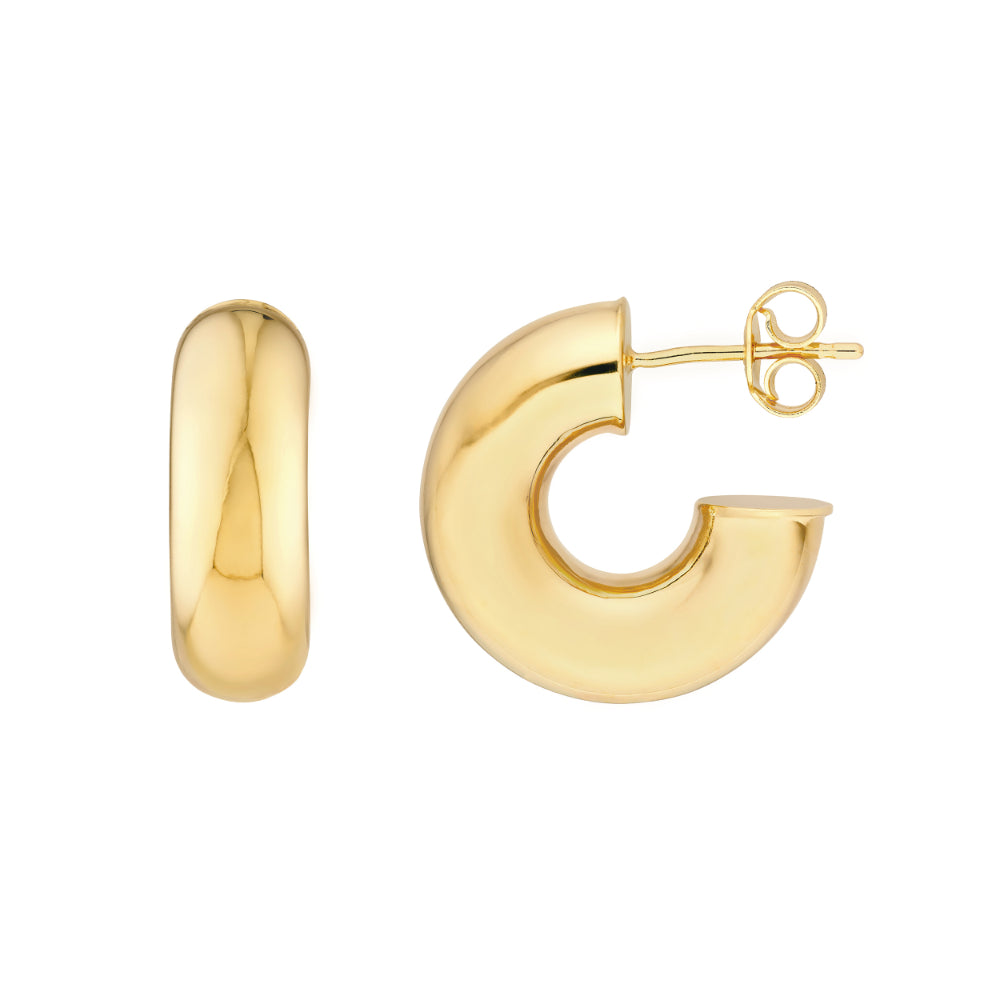 gold tone hoop earrings on white background
