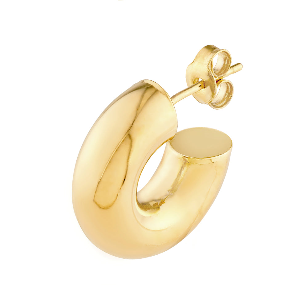 gold tone hoop earring on white background