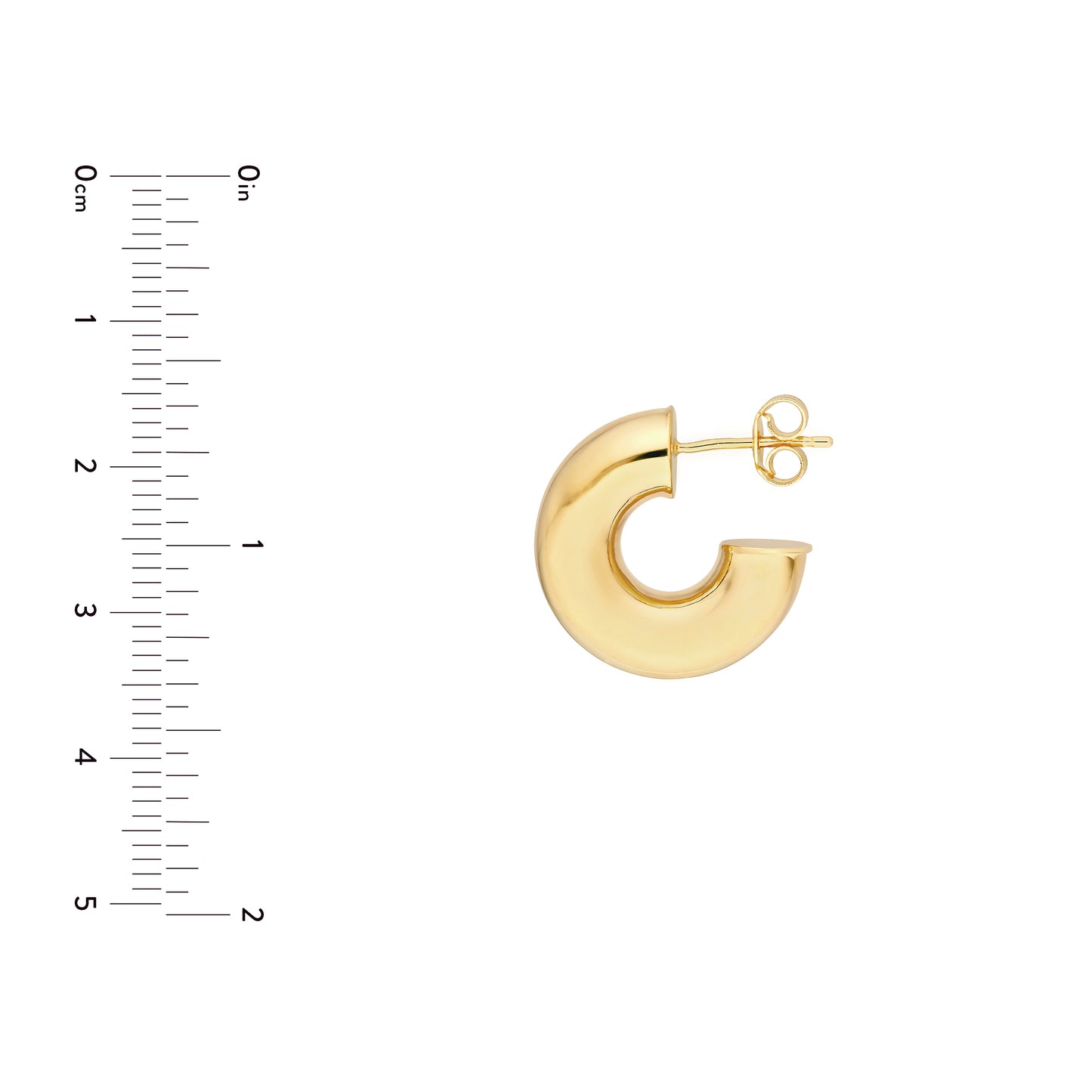 gold tone hoop earring on white background next to a scale