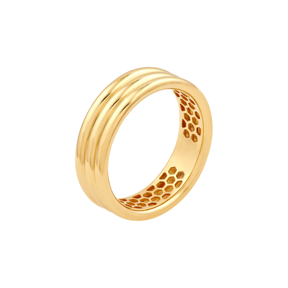 triple row gold tone band on white background on angle