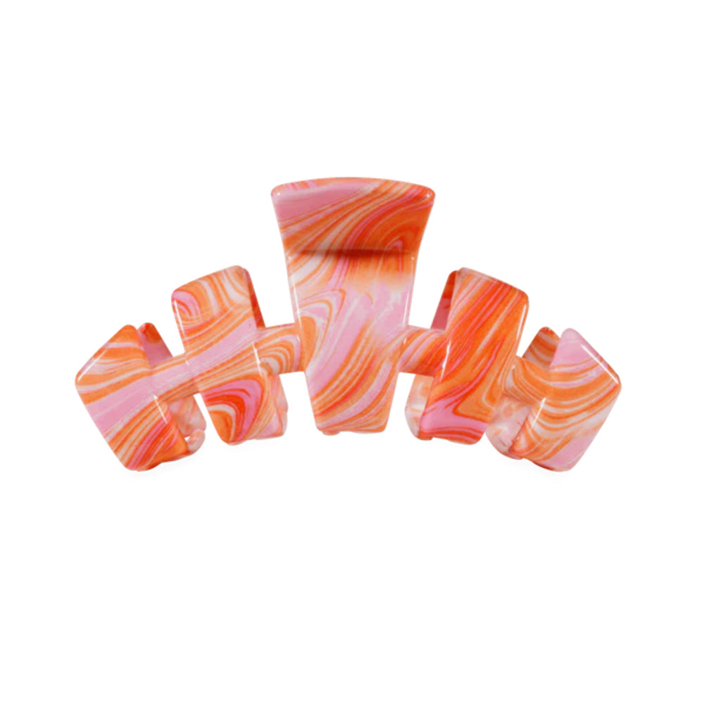 Set of marbled hair clip in pink and orange on a white background