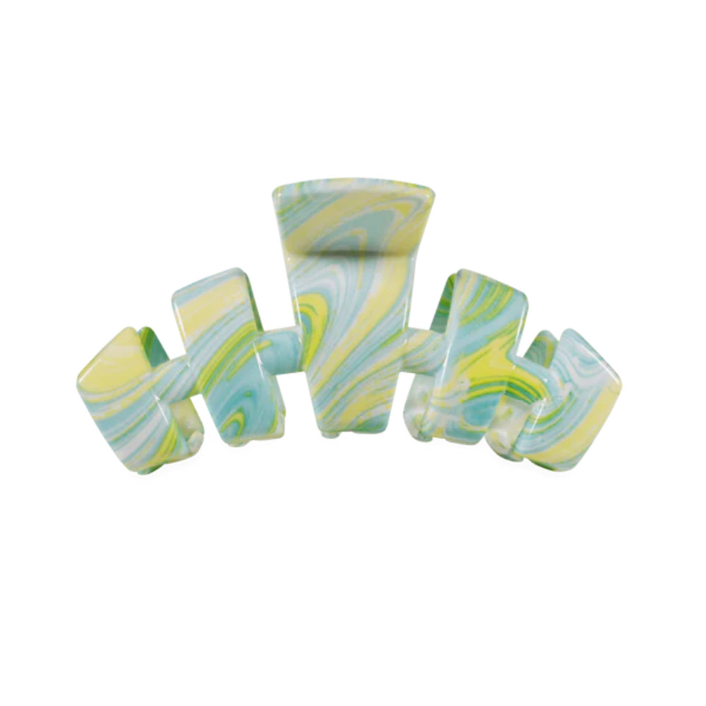 Set of marbled green and blue hair clip on a white background