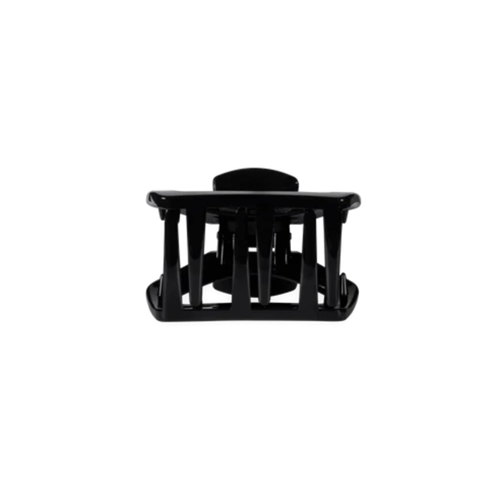 A black plastic hair claw clip shown from the front on a solid white background.