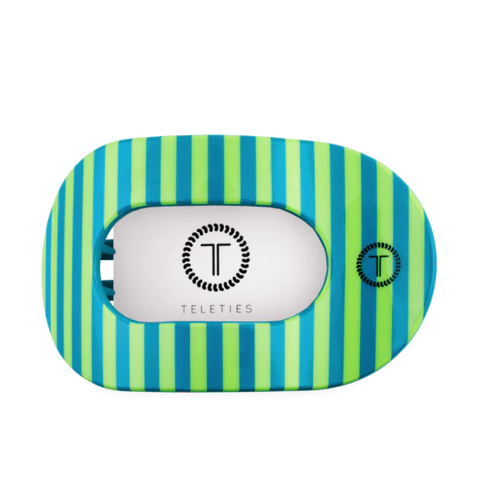 Striped blue and green striped hair clip with 'Teleties' branding on a white background