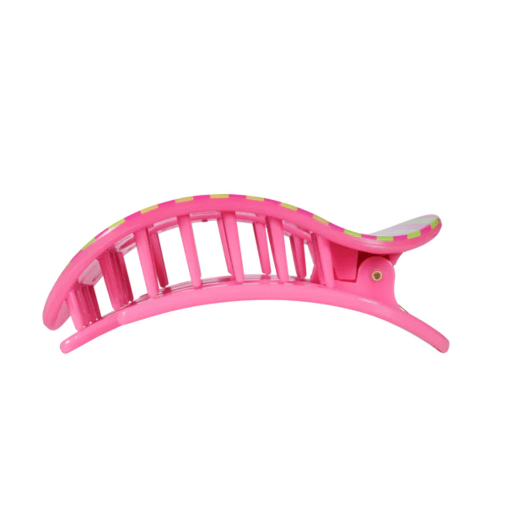 Pink hair clip on a white background