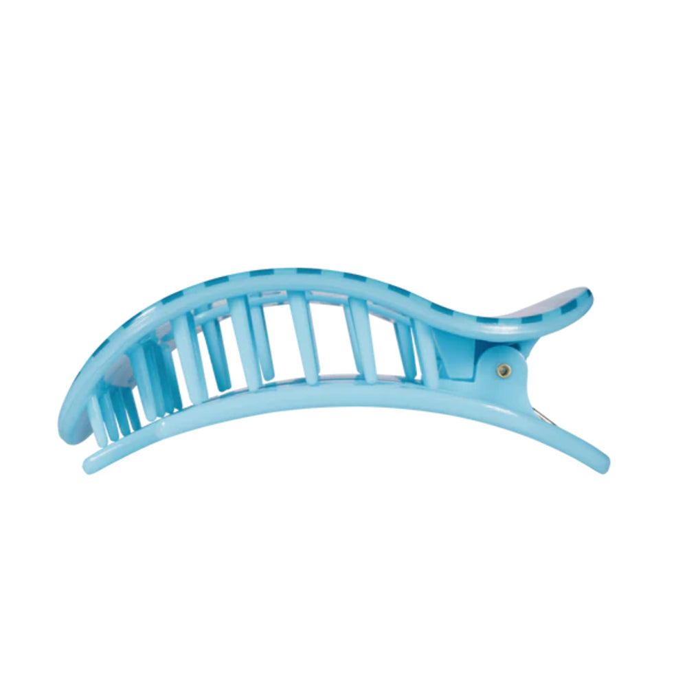 Light blue hair clip on a white background