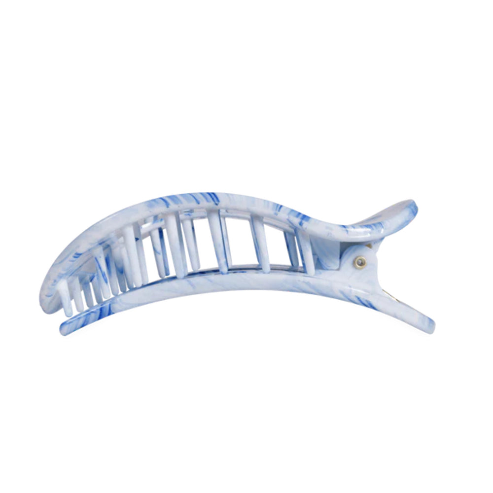 Marble-patterned hair clip on a white background