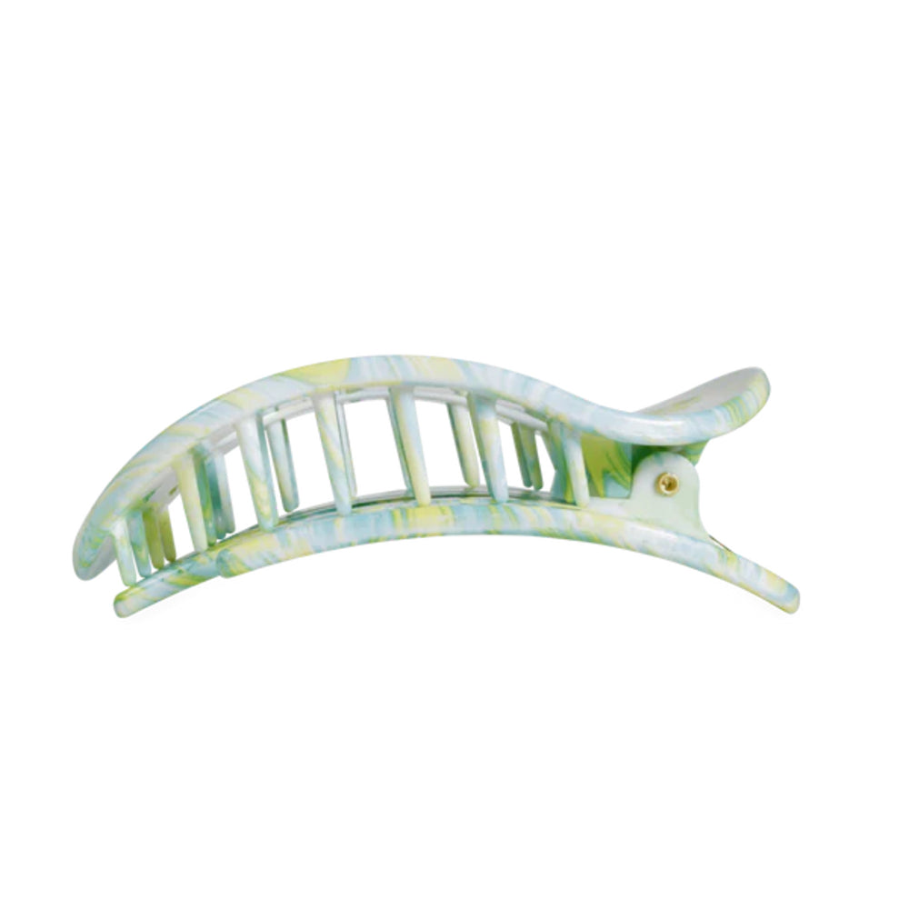Marbled patterned hair clip on a white background