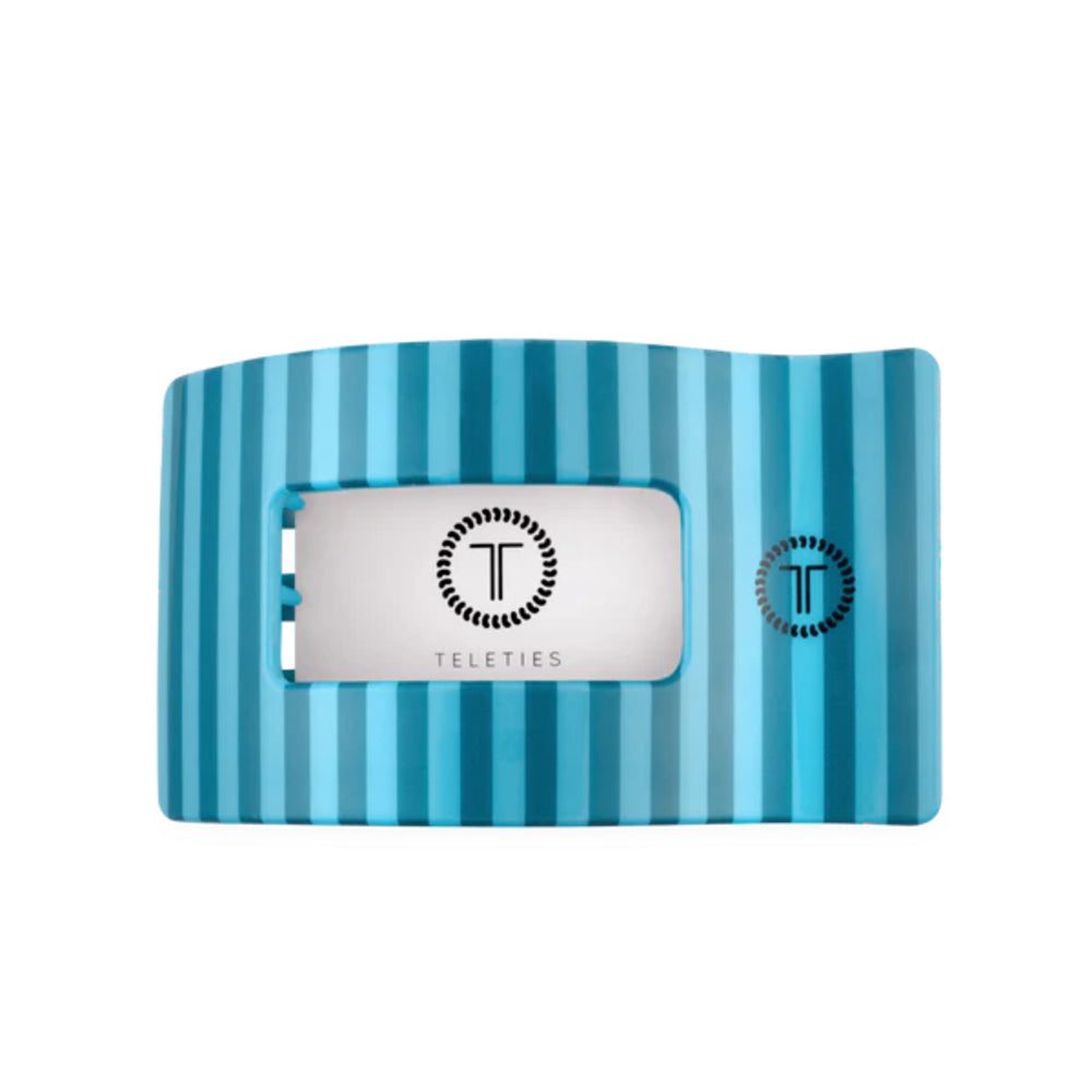 Blue striped clip with 'Teleties' branding on a white background