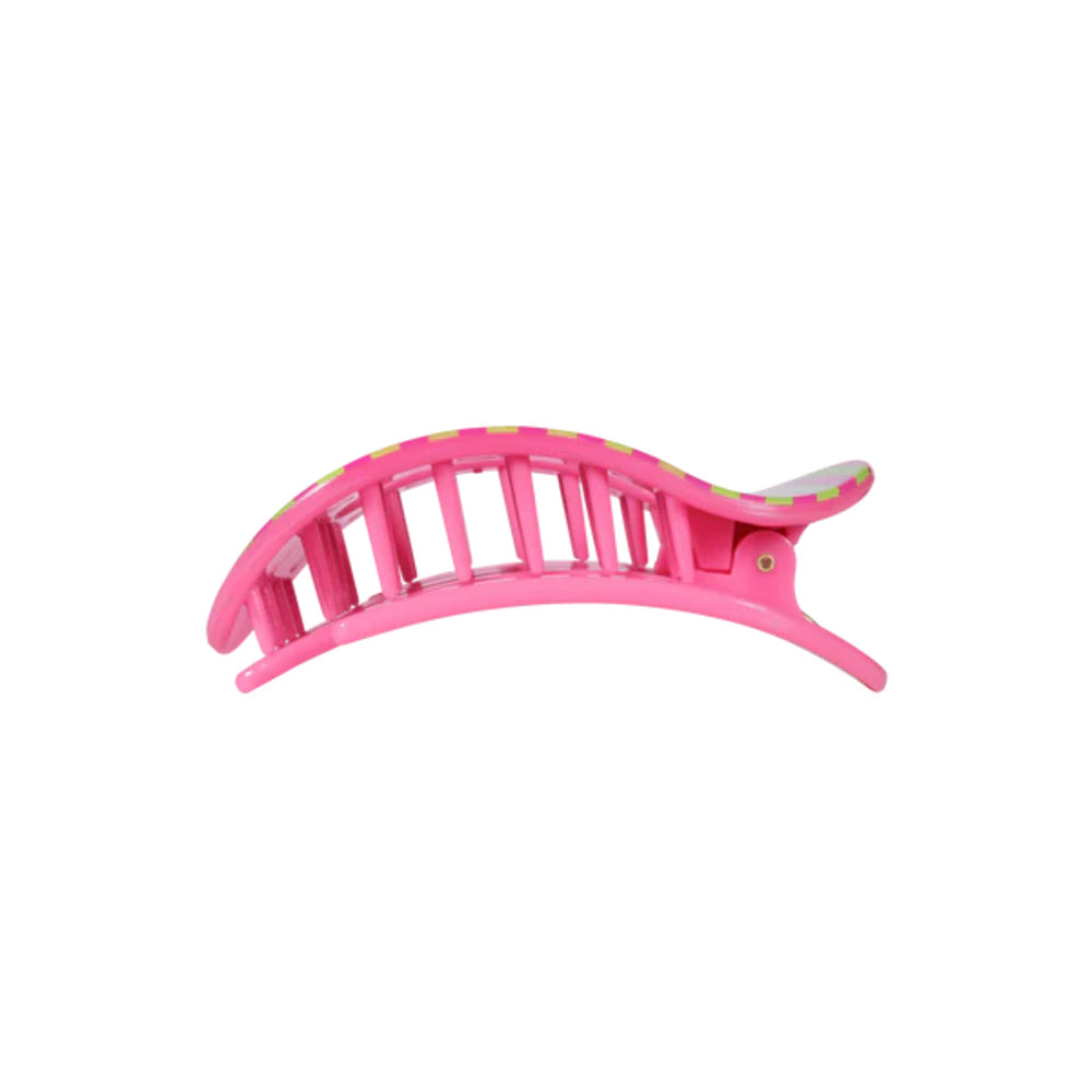 Pink hair clip on a white background