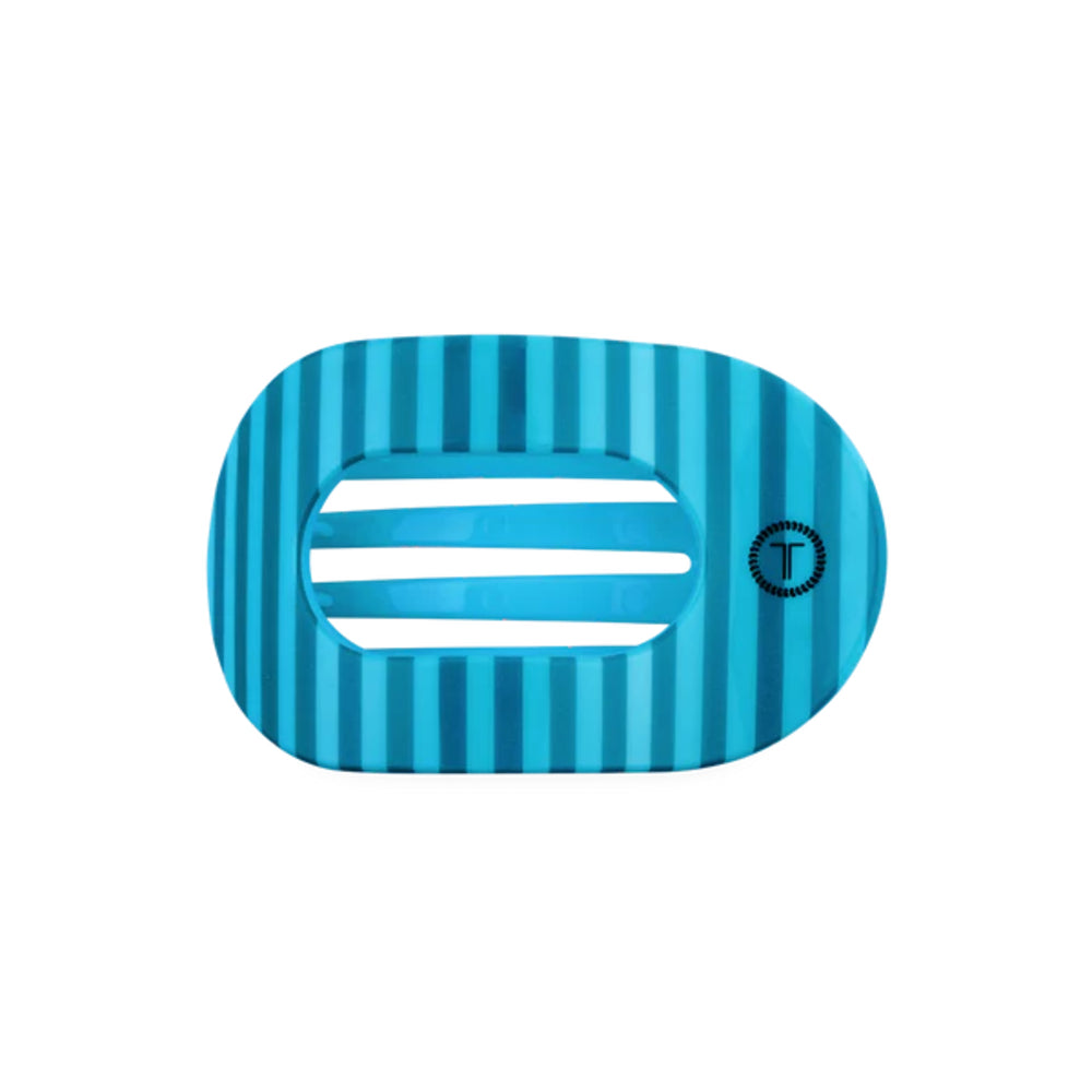 Blue striped hair clip with a brand logo on a light gray background