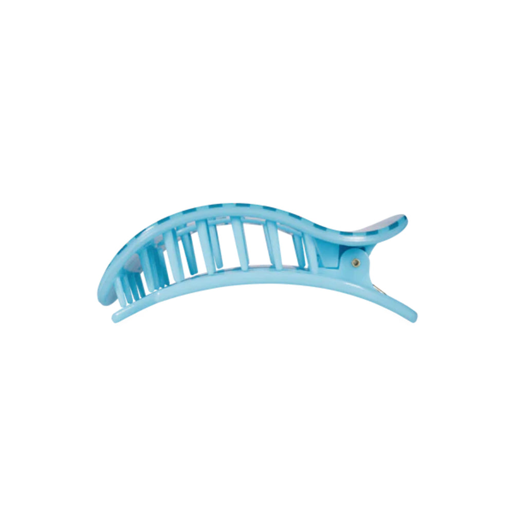Light blue hair clip on a white background