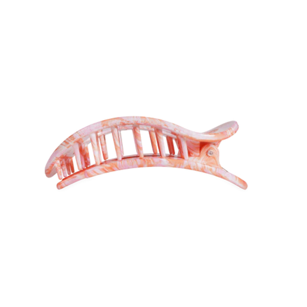 Pink hair clip on a white background