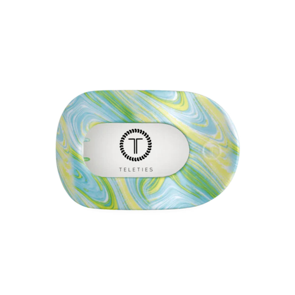 Marbled patterned product with 'Teleties' branding on a white background