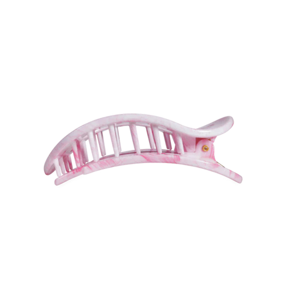 Close-up of a pink hair clip on a white background