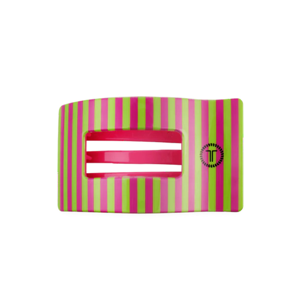 Striped pink and green hair clip on a white background