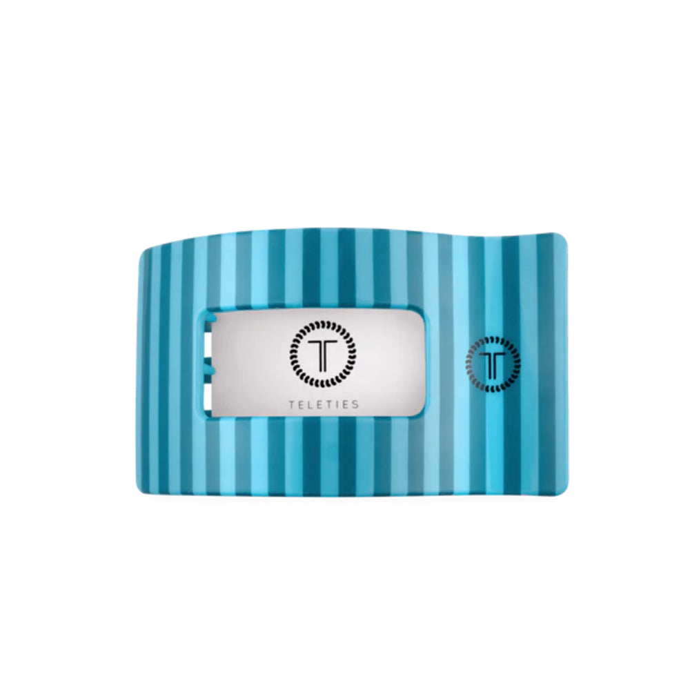 Blue striped hair clip on a white background