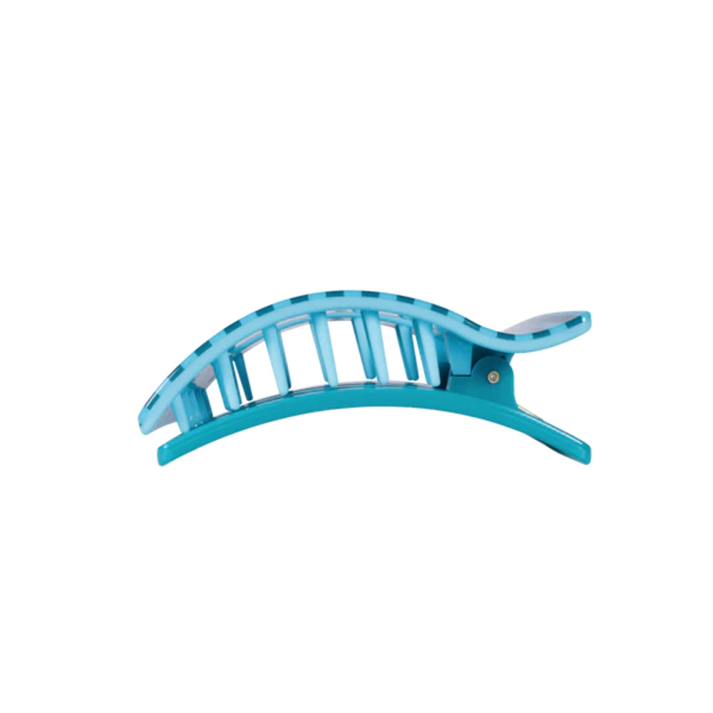 Blue hair clip on a white background