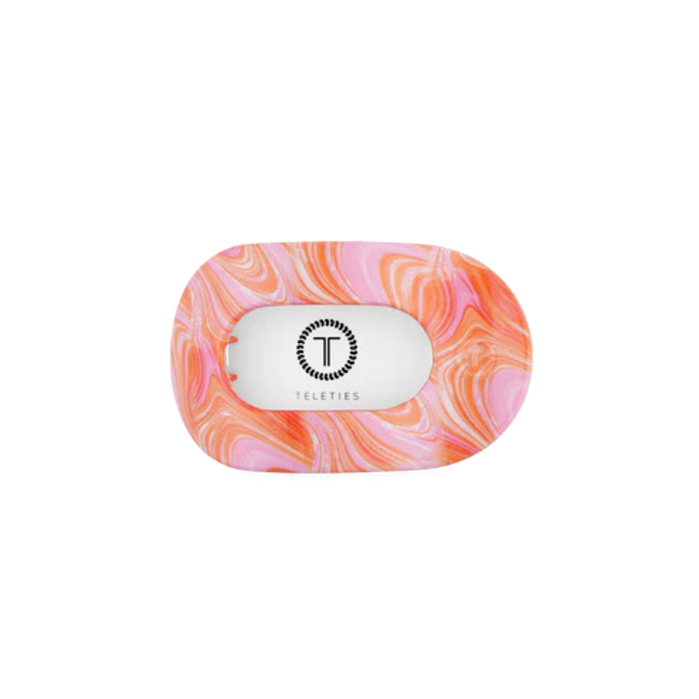 Marbled pink and orange compact hair clip with a brand logo on a white background