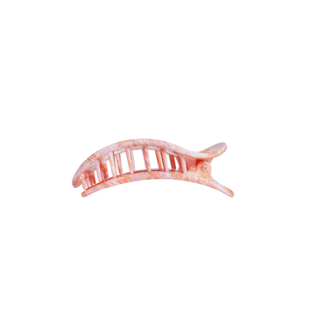 Pink hair clip on a white background