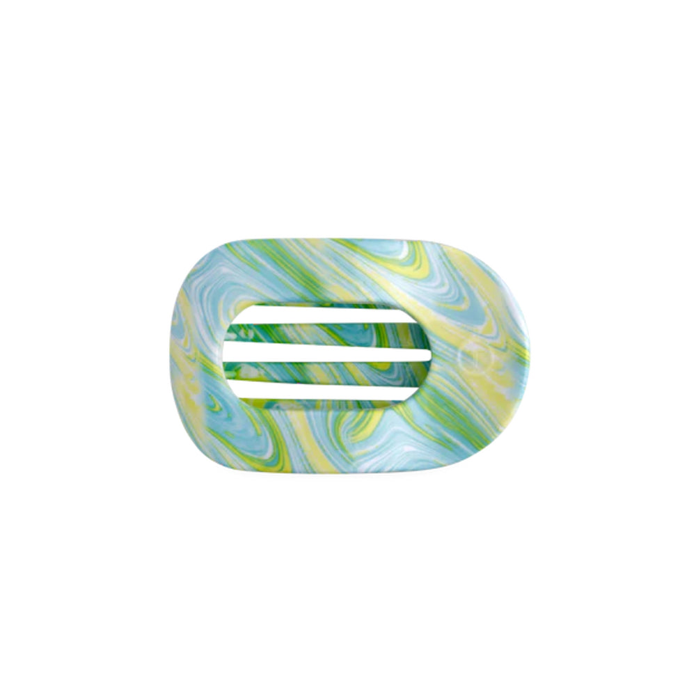 Marbled rectangular hair clip with a central cutout on a white background