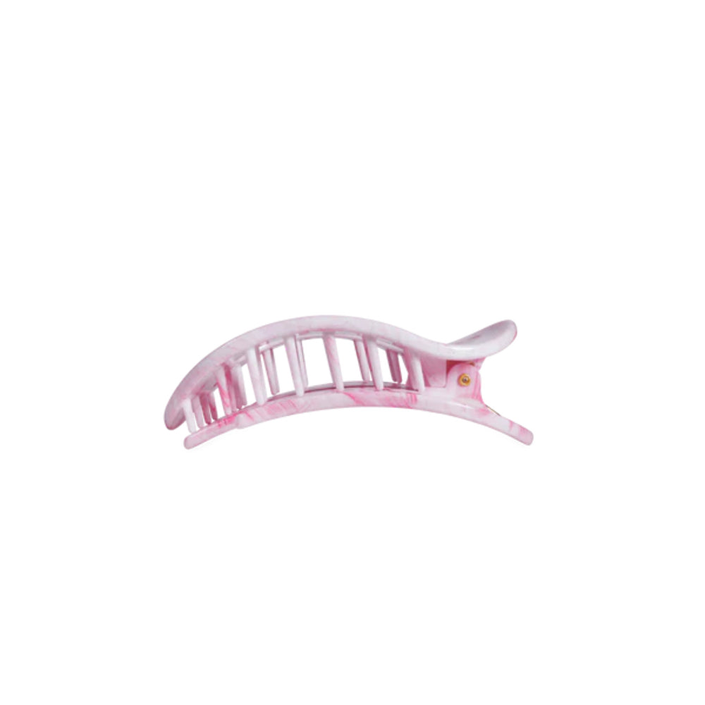 Pink hair clip on a white background