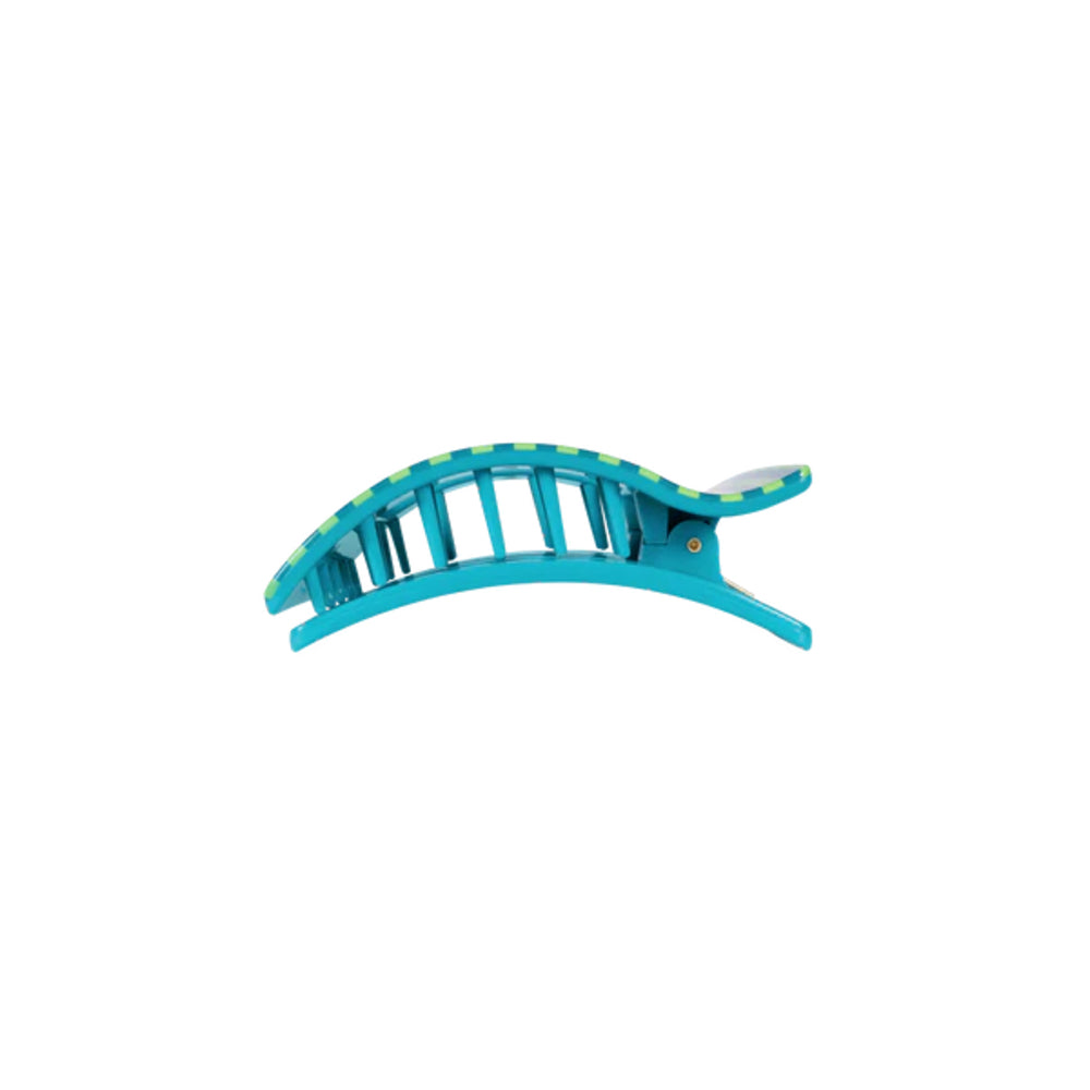 Blue hair clip on a white background