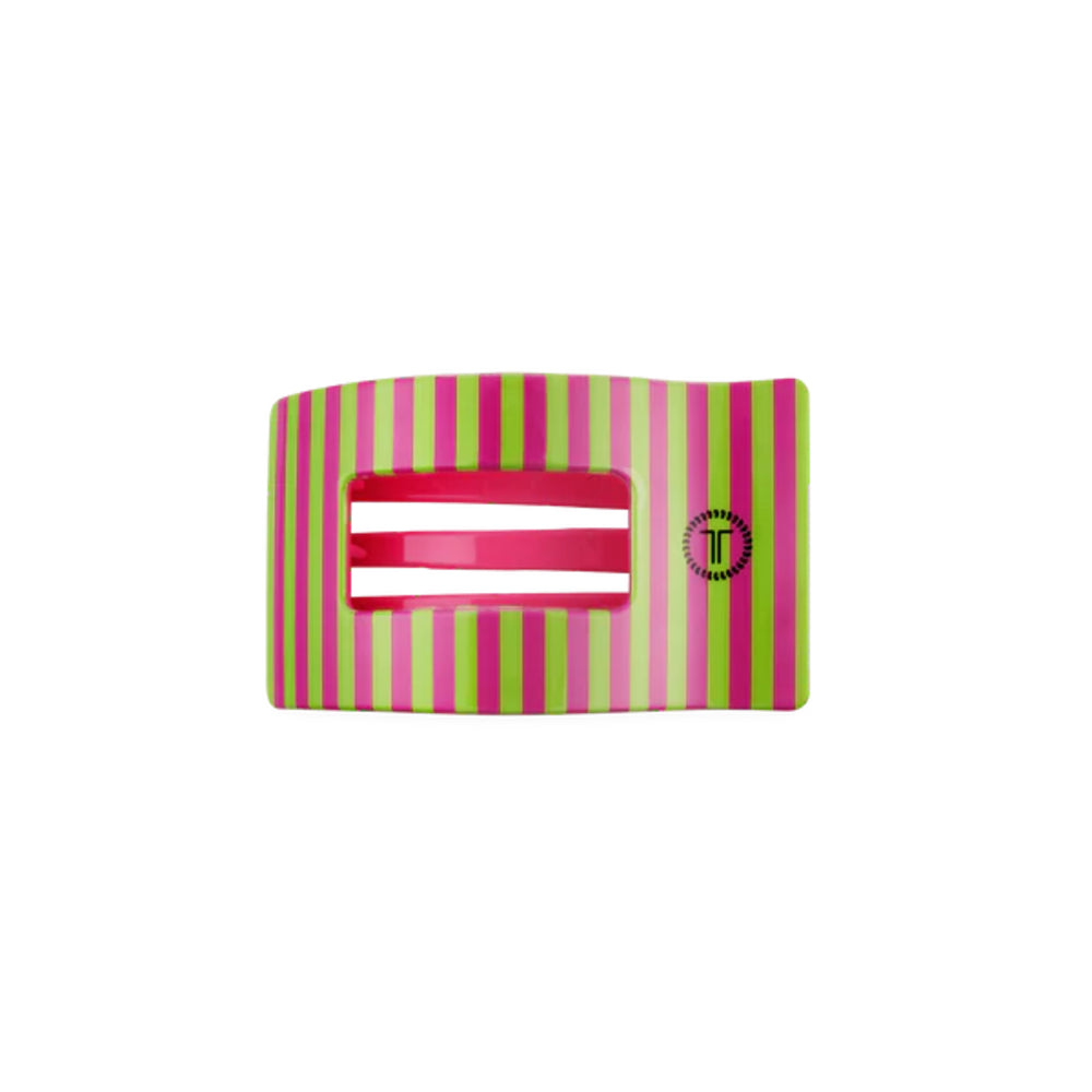 Striped hair clip with a pink center on a white background