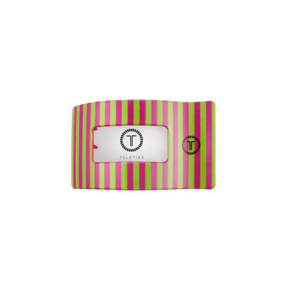 Striped hair clip with a brand label on a white background