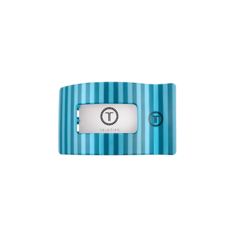 Blue striped HAIR CLIP with a brand logo on a white background