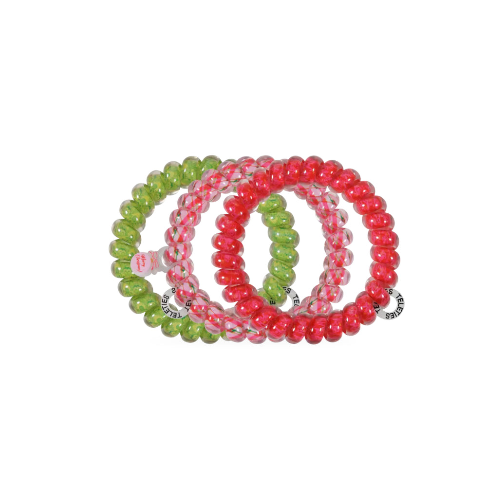 A set of hair ties on a white background. 