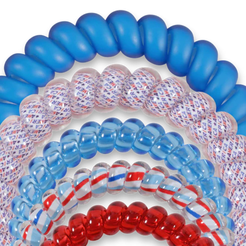 Collection of blue, red, and white hair ties arranged in a circular pattern on a white background.