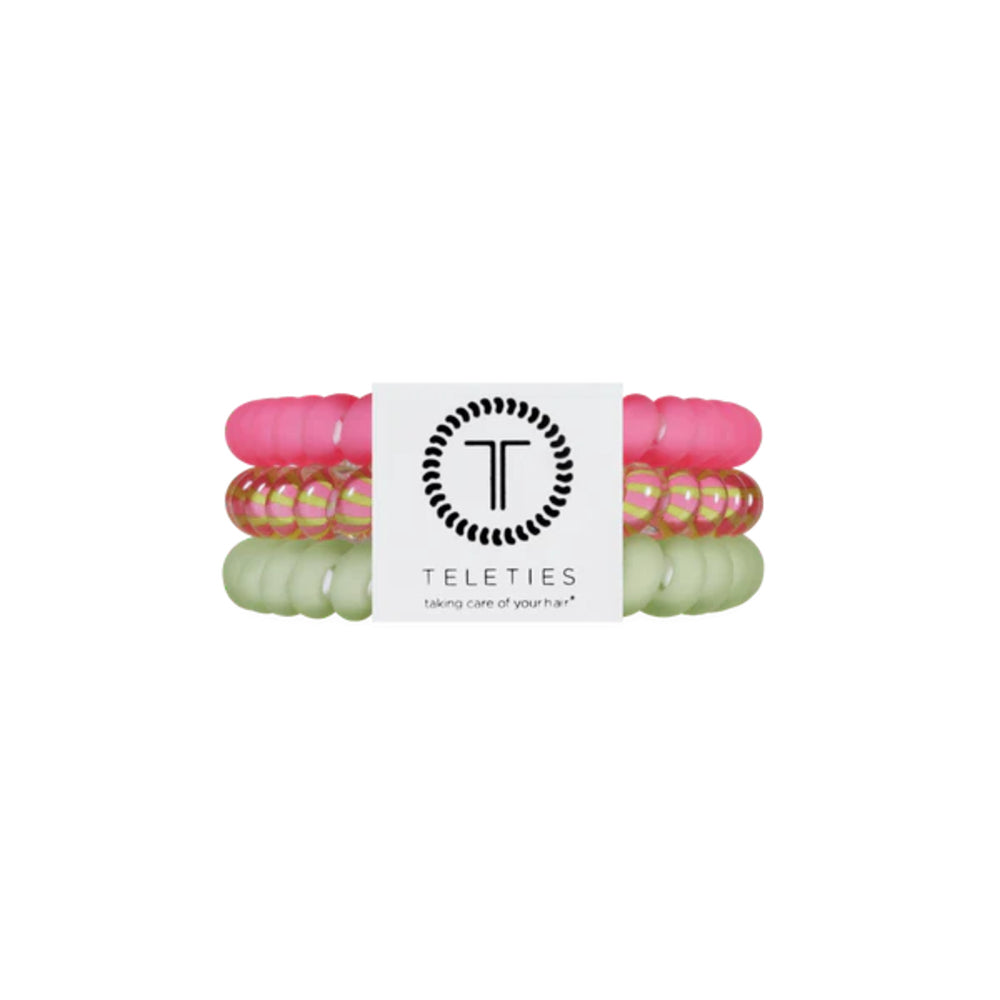 Set of colorful hair ties with a Teleties label on a white background