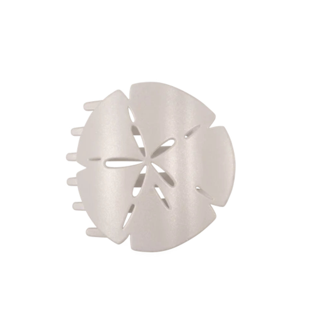 White plastic hair clip on a white background