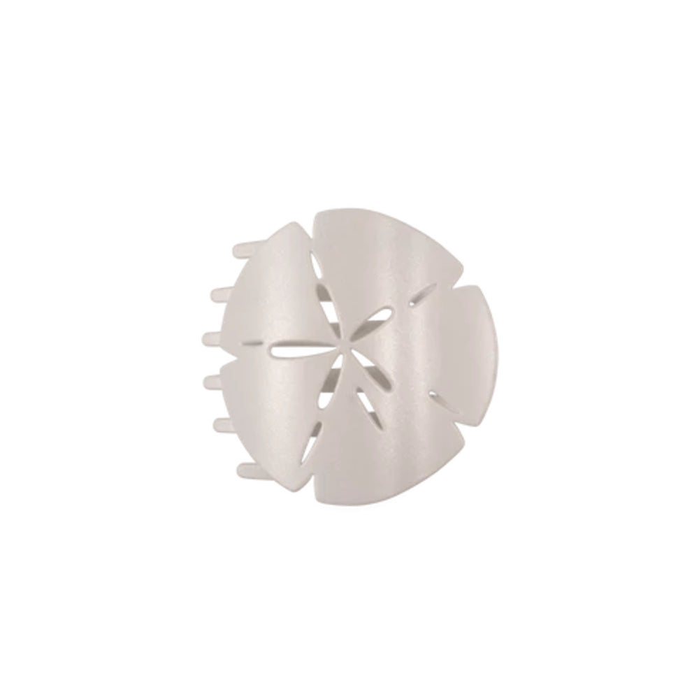 White plastic hair clip on a white background