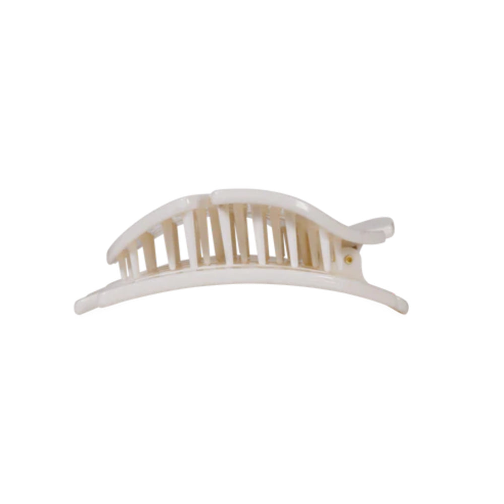 White hair clip on a white background