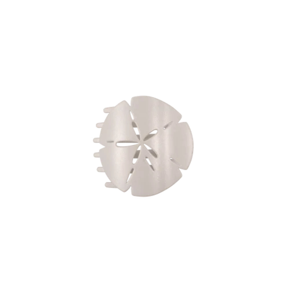 White plastic hair clip on a white background
