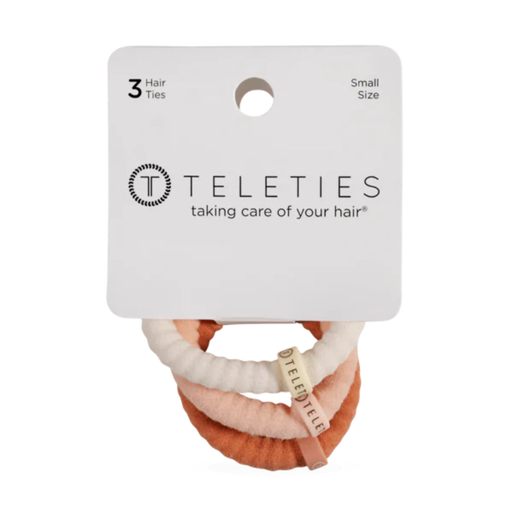 Packaging of Teleties hair ties with three hair ties inside on a white background