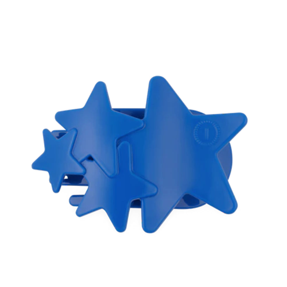 Blue star-shaped hair clip on a white background