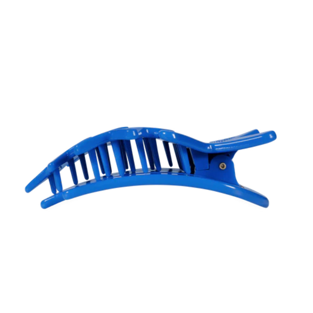 Blue hair clip on a white background