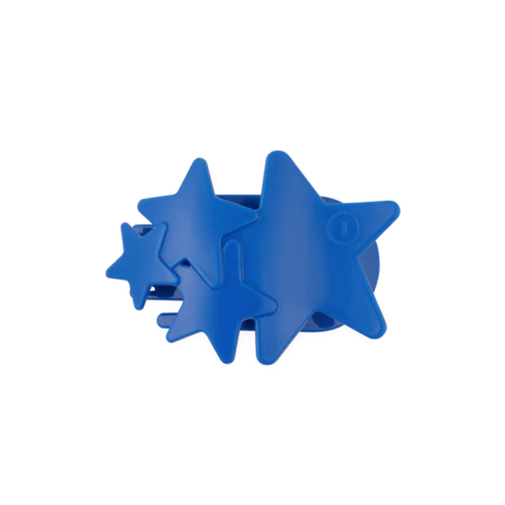 Blue star-shaped hair clip on a white background