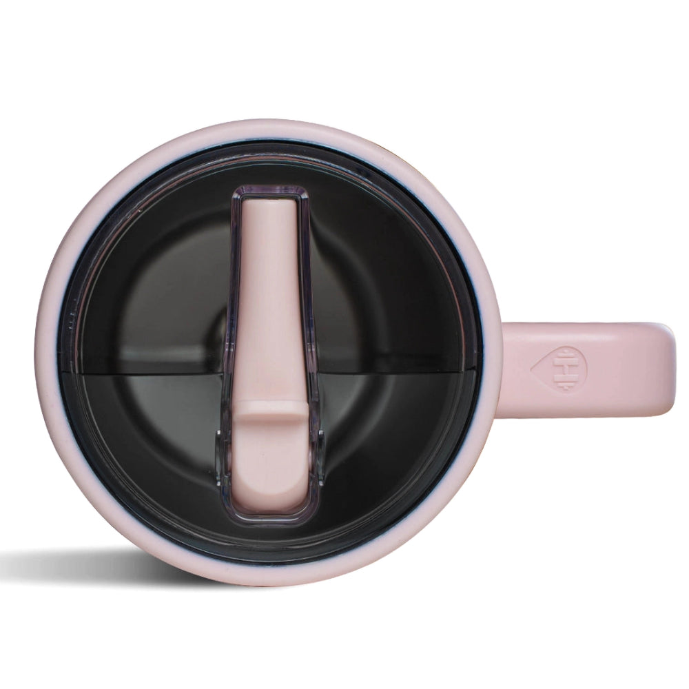 Pink mug with a black interior on a white background.