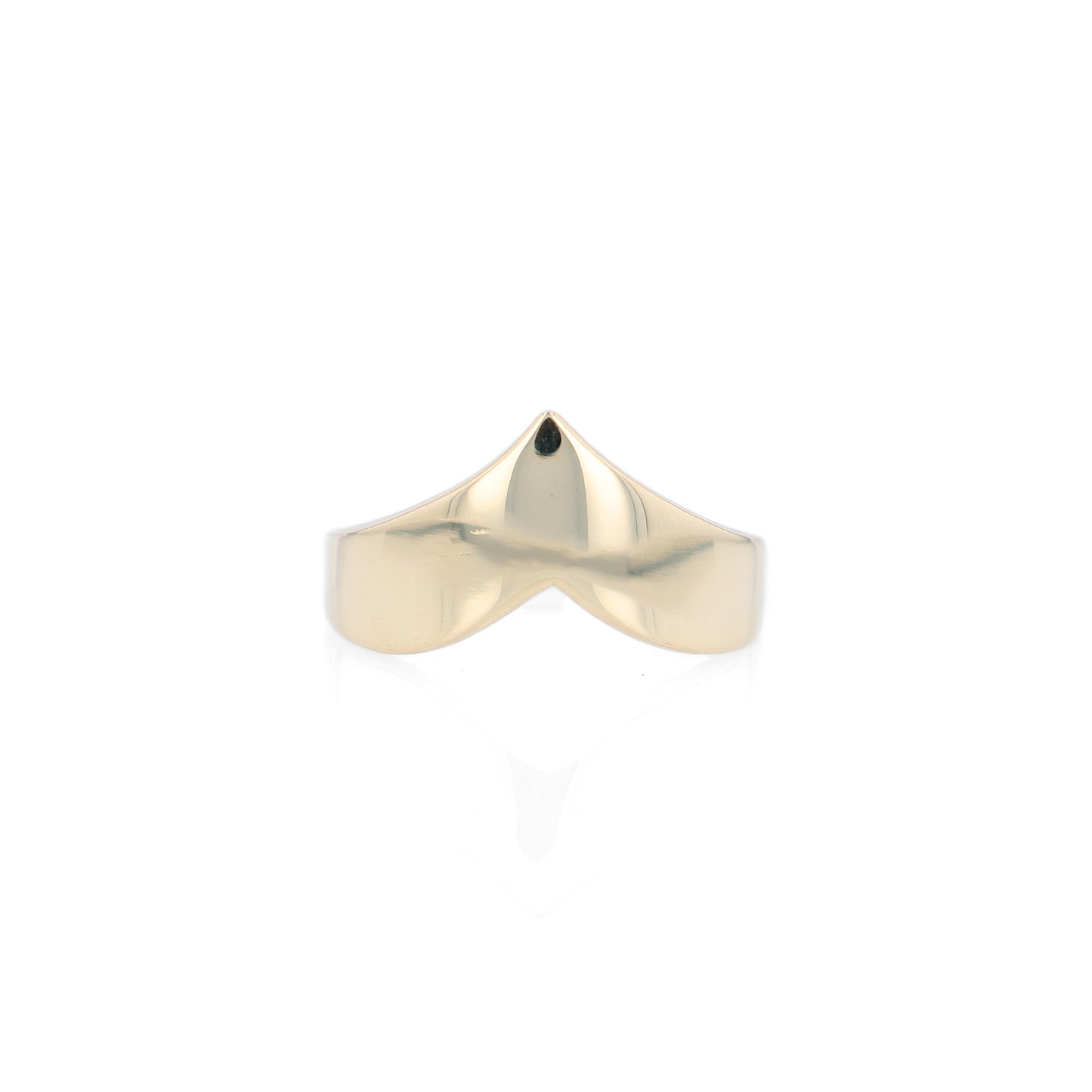 Polished gold chevron design ring on a white background