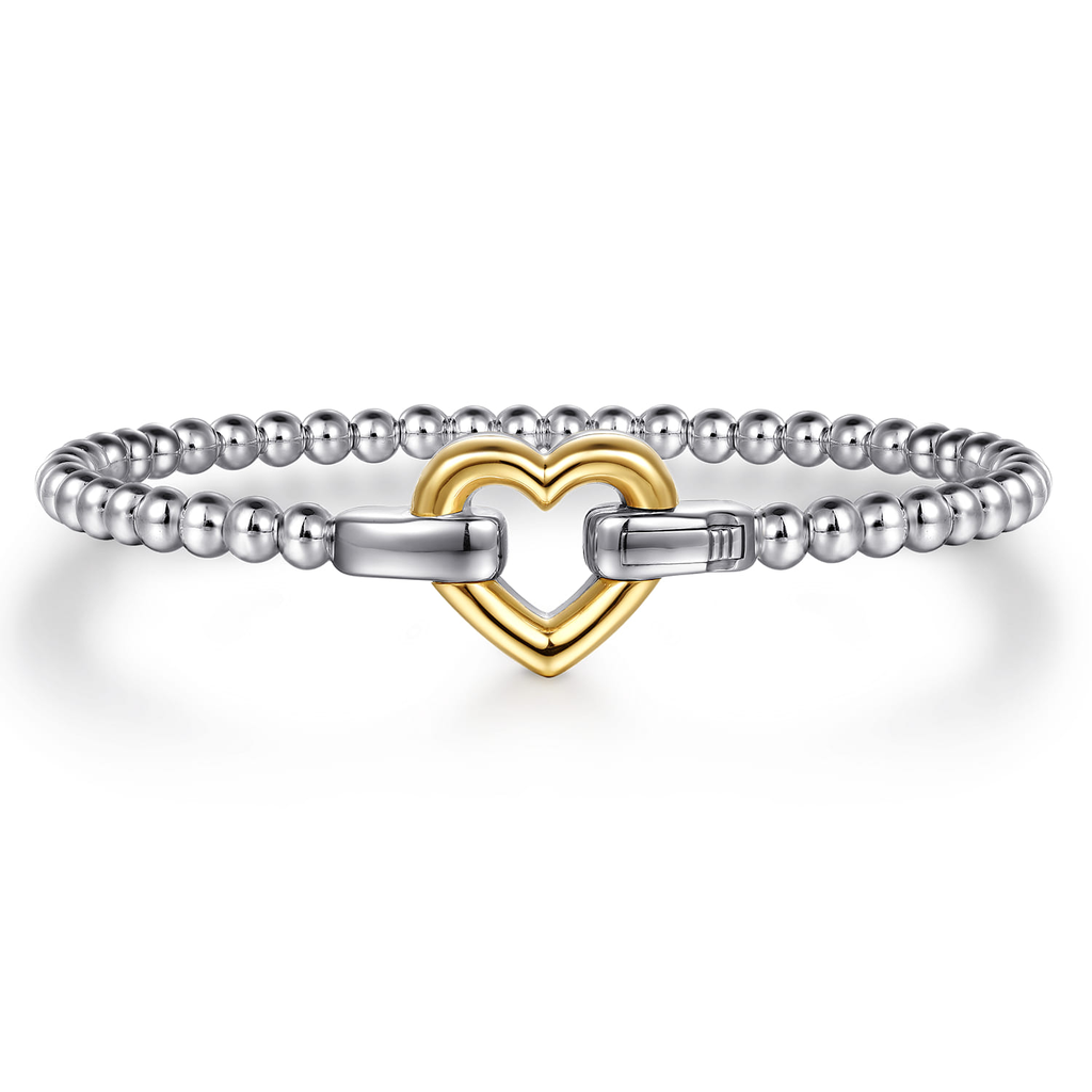 Bracelet with a heart-shaped clasp on a white background
